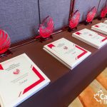 Business Impact Awards trophies and finalist plaques